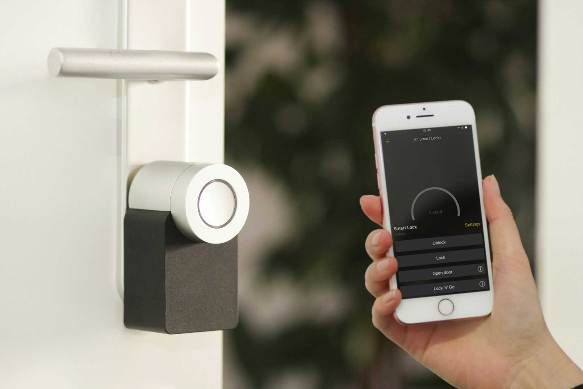 Xfinity home security system with touchscreen control panel, indoor camera, and smart sensors installed in modern home interior.